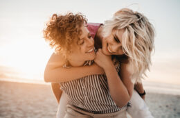 Female couple on beach